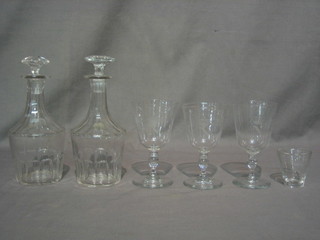 A pair of 18th/19th Century club shaped decanters, 3 wine glasses and a shot glass, all with crowned M