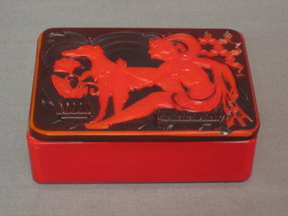 An Art Deco intaglio cut red glass rectangular trinket box decorated a lady with an Afghan hound 4 1/2" (chipped)