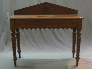A Victorian oak hall table with raised back, raised on turned supports 41"