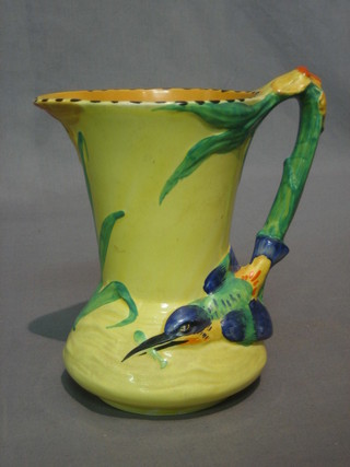 A Burleigh yellow glazed Art Deco pottery jug 7", the handle decorated a Kingfisher 