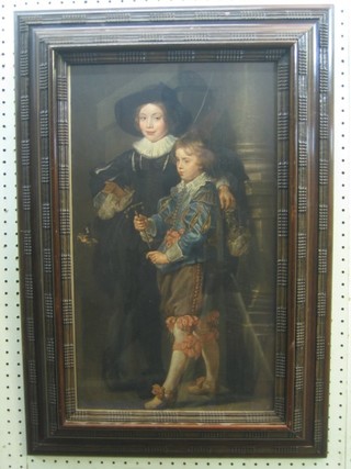 A Medici Society print "17th Century Scene of Two Standing Boys" 20" x 12" contained in a Jacobean style frame