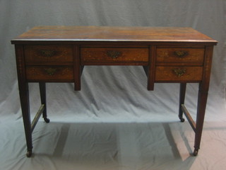 A Victorian inlaid rosewood dressing table fitted 1 long drawer flanked by 4 short drawers, raised on square tapering supports, 47"