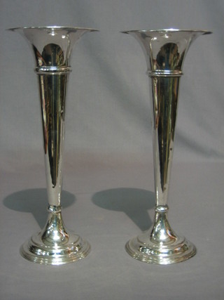 A large and impressive pair of waisted silver plated vases 15"