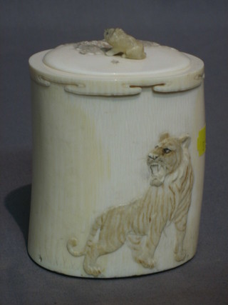 A circular Japanese ivory trinket box carved tigers 4"