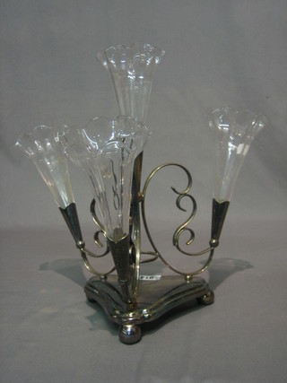 A triangular silver plated 5 glass epergne complete with glasses