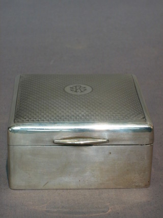 A square silver cigarette box 3"