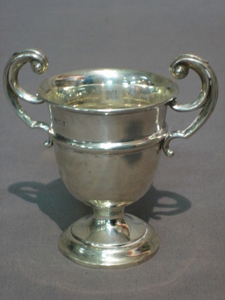 A silver twin handled trophy cup, Birmingham 1928 2 ozs