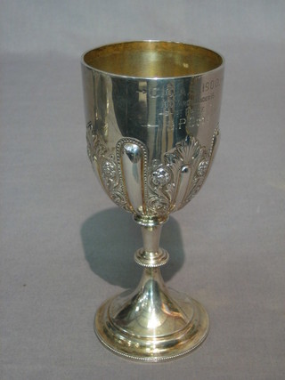 A Victorian embossed silver trophy goblet, London 1893, 4 ozs, engraved