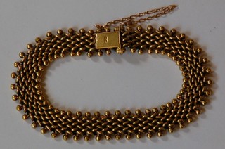 A 15ct gold multi link bracelet