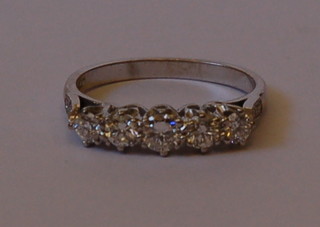 A lady's 18ct white gold dress/engagement ring set 5 graduated diamonds and 6 diamonds to the shoulders approx 0.80ct