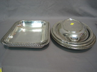 3 oval silver plated entree dish bases, an entree dish lid and 2 rectangular entree dish bases