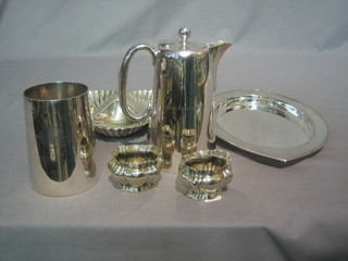 An oval silver plated dish, a silver plated tankard, 2 silver plated salts and a 3 section hors d'eouvres dish