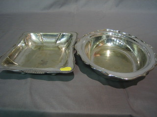 A rectangular silver plated cake basket and an oval dish