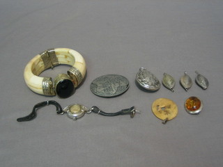 An ivory effect bracelet and a small collection of costume jewellery