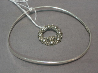 A Georg Jensen silver collar marked 9256 Denmark A38 and a silver brooch