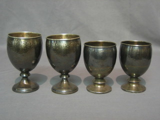 4 Continental planished silver goblets, the bases marked 900, 12 ozs