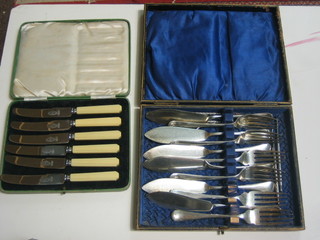 A set of 6 silver plated Old English pattern fish knives and forks and a set of 6 tea knives