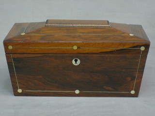 A Victorian rosewood twin compartment tea caddy of sarcophagus form with mother of pearl line inlay, the interior complete with glass mixing/sugar bowl and 2 compartments 11"