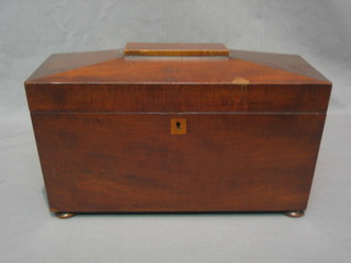 A Victorian mahogany sarcophagus shaped twin compartment tea caddy (no bowl to centre) 11"