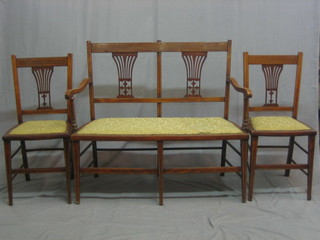 An Edwardian 7 piece drawing room suite comprising double chair back settee, 2 open arm carver chairs and 4 dining chairs 