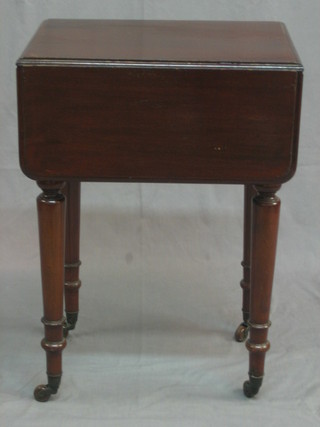 A Victorian mahogany drop flap side table fitted 2 drawers and raised on turned supports 20"