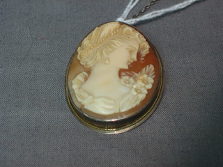 A shell carved cameo portrait brooch of a lady 1"
