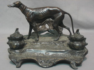 A reproduction Victorian bronze twin bottle inkwell  decorated a grey hound 10"