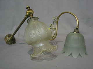 A 19th/20th Century gilt metal and glass wall light and 1 other