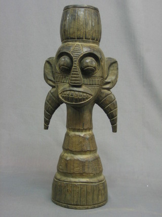 An African carved wooden figure 19"