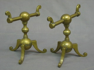 A pair of Art Nouveau brass fire dogs 6 1/2"