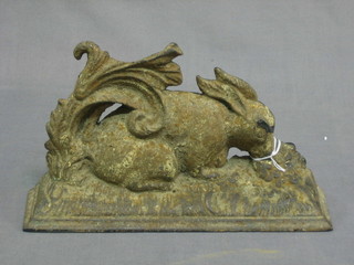 A Victorian cast iron door stop in the form of a rabbit 10"