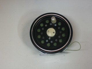 A Winfield centre pin fly reel 4"