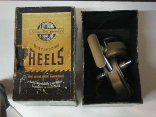 A multiply fishing reel by J Young, boxed