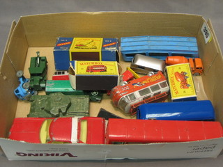 A Matchbox digger crane no. 4, boxed, do. Trolley bus no. 56 boxed and a small collection of various toy cars
