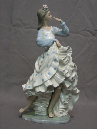 A Nao figure of a Spanish standing dancer 14"