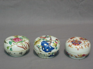 3 Oriental circular jars and covers with floral decoration 3"