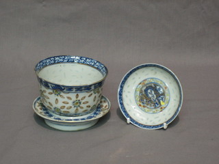 A 19th Century Oriental rice pattern bowl, the base with 4 character mark together with matching stand and lid