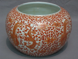 An 18th Century orange glazed Oriental vase, the base with blue 4 character mark 6"