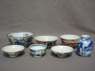 A 19th Century Oriental blue and white vase, the base with blue 6 character mark 3" and 6 various Oriental bowls