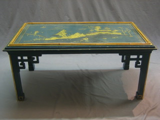 A rectangular blue lacquered coffee table with chinoiserie decoration 40"