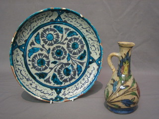 An Ismic pottery jug 5 1/" and a similar plate 9"