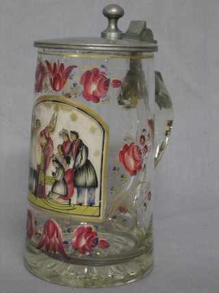 A 19th Century Continental enamelled glass tankard with 5 bar hinged pewter lid, the body decorated a confirmation scene with Bishop, 6 1/2"