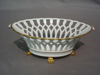 A Continental porcelain ribbon ware boat shaped basket 12"