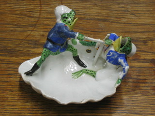 A 19th Century Continental porcelain scallop shaped dish decorated 2 fighting frogs in military uniform 5"
