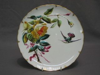 A Victorian porcelain plate by A B Daniell & Sons decorated bird amidst a branch 9" circular