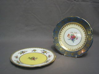 A circular Aynsley plate with floral decoration with in a gilt and blue banding 8 1/2" and 1 other Aynsley plate decorated fruit 9"