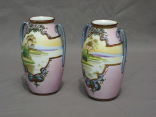 A pair of Noritake twin handled vases decorated landscapes against a pink ground 5"