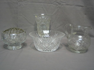 A cut glass vase 9", do. jug 7", 2 cut glass bowls 9" and a cut glass rose bowl 7"