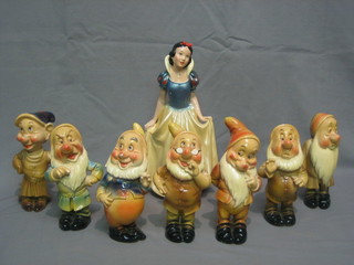 G Leonardi, a pottery figure group of Snow White and The Seven Dwarfs