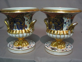 A handsome pair of reproduction Derby twin handled jardinieres of campanular form 14"